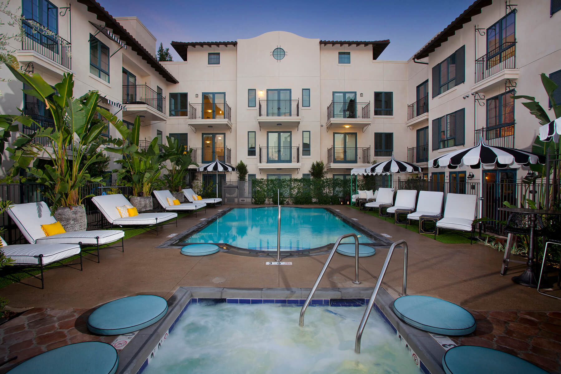 The luxury pool and lounge seating at the Candara at Hancock Park in Los Angeles, California.